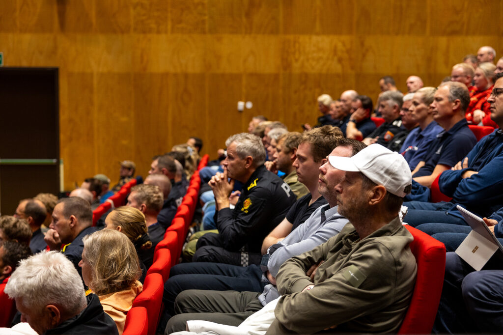 Publikum under konferanse på SAR61°N
